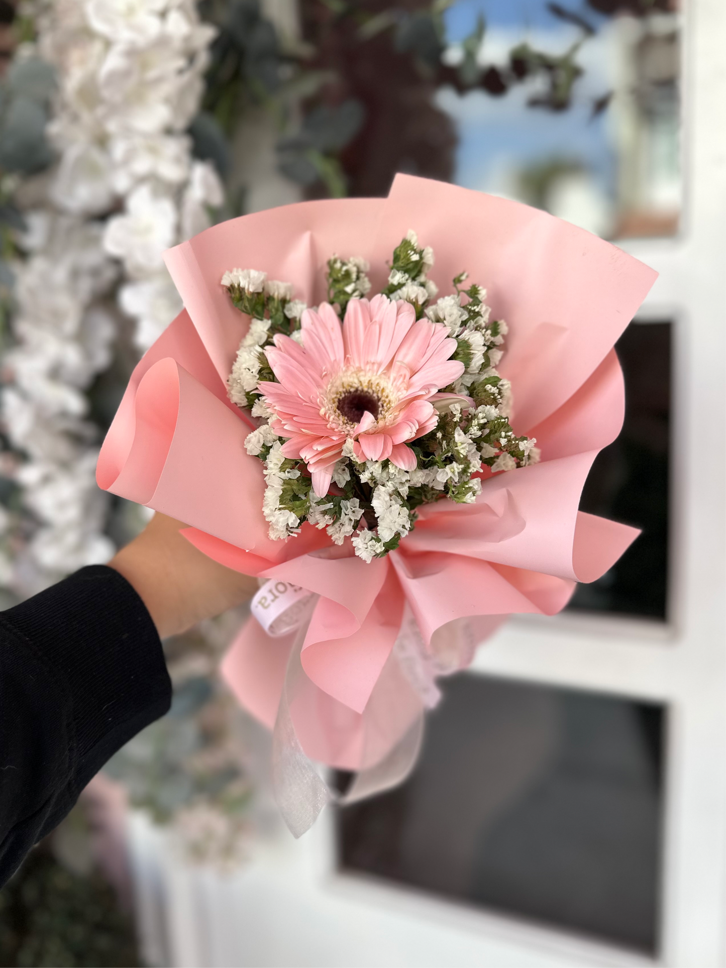 Detalle gerbera y Leticia